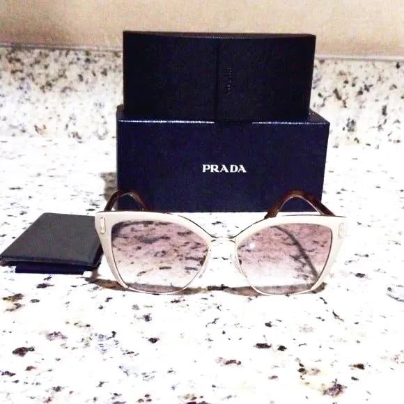 Prada woman sunglasses spr 56T new